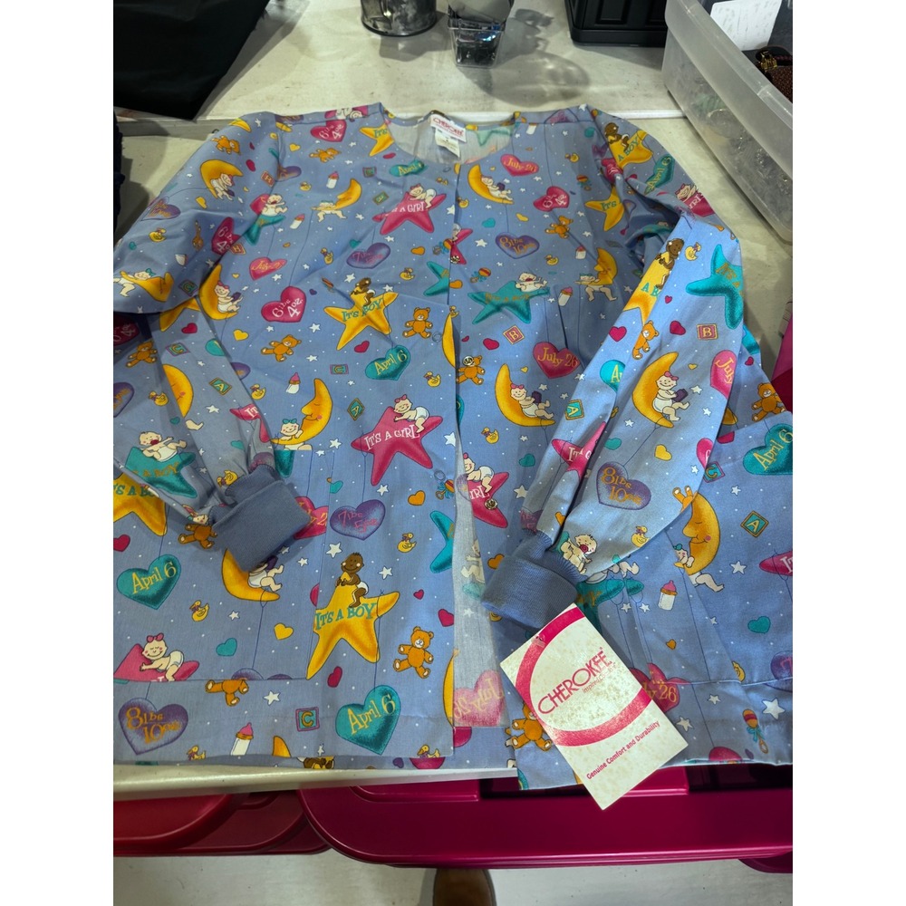 Cherokee Inspired Comfort Women Medium Blue Baby Nursery Print Scrub Jacket NWT